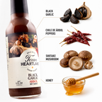 Black garlic hot sauce ingredients with chile de árbol, shiitake mushrooms and honey